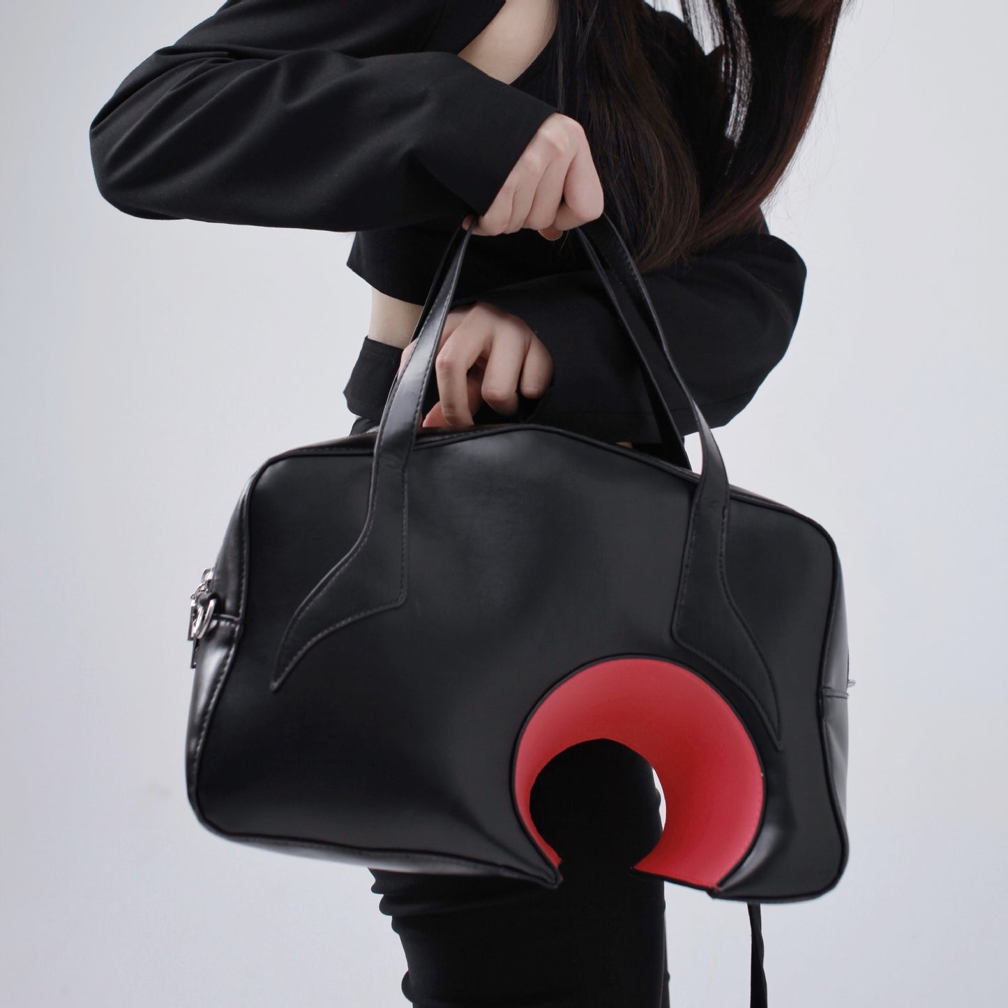 Small and niche personality PU round table digging geometric bag for men and women hand-held single shoulder crossbody bag
